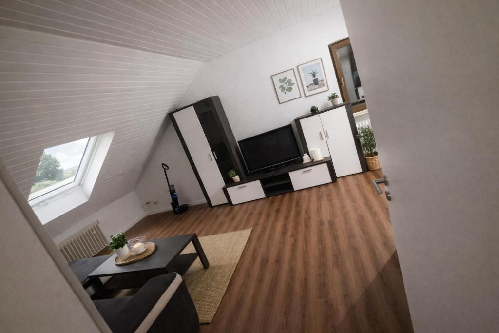 Monteurwohnung Karben Wohnung 2 — Wohnzimmer im Dachgeschoss